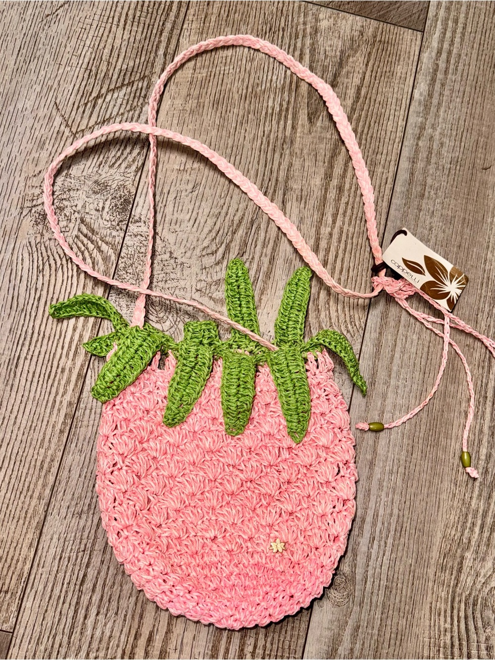 Capelli Straw New York crochet strawberry crossbody purse pink green